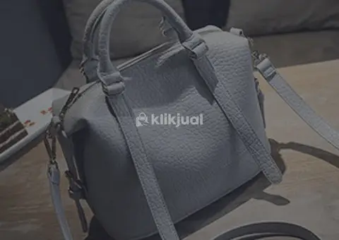 Tas tangan kulit asli