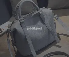 Tas tangan kulit asli